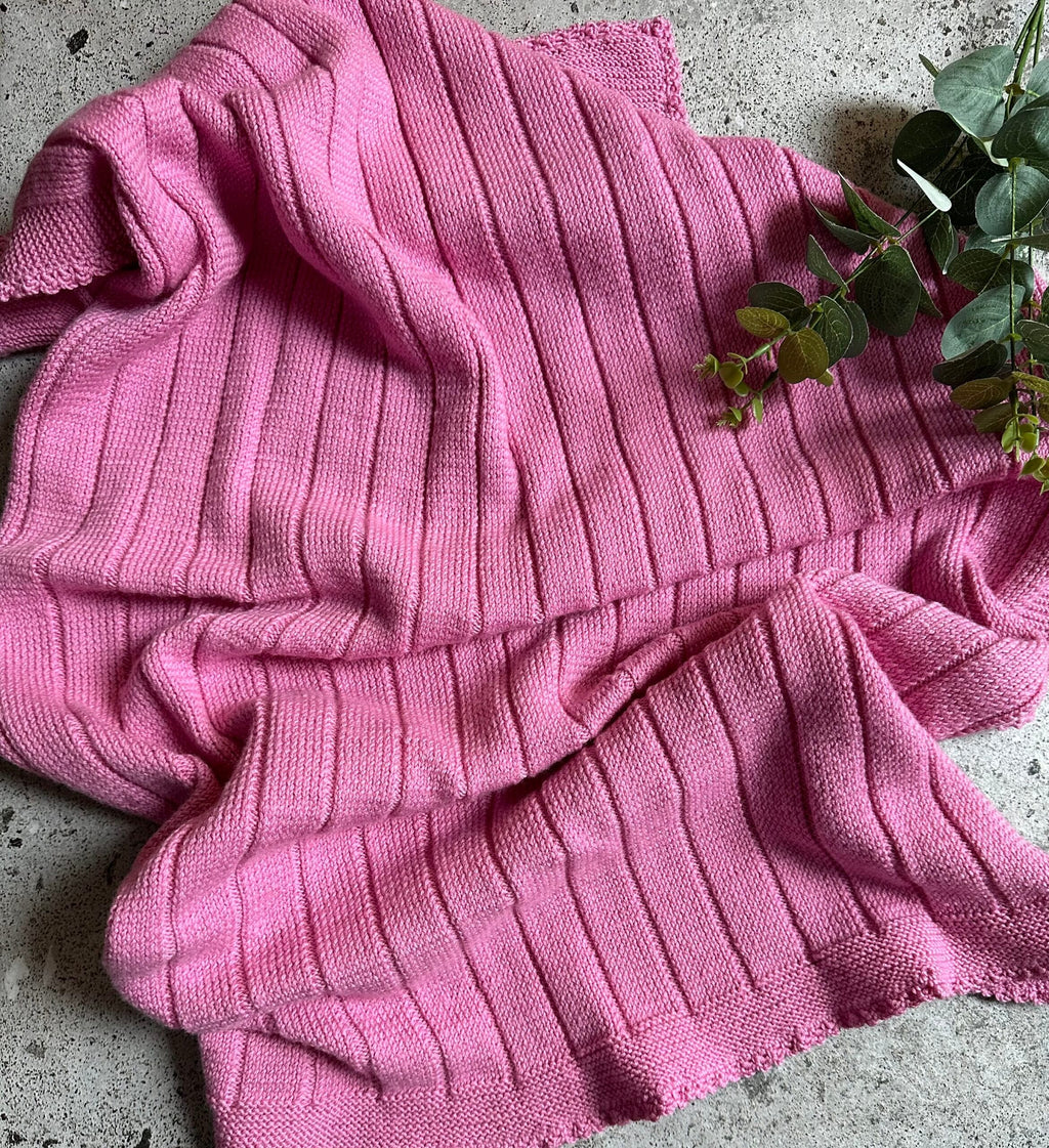 Merinoullteppe "Rosa ømhet"